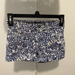 Blue and white floral denim shorts